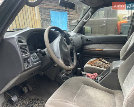 Зеленый Ниссан Патрол, объемом двигателя 2.95 л и пробегом 300 тыс. км за 9800 $, фото 5 на Automoto.ua