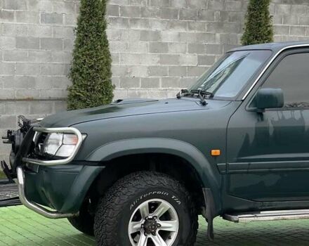 Зелений Ніссан Патрол, об'ємом двигуна 3 л та пробігом 446 тис. км за 15000 $, фото 10 на Automoto.ua