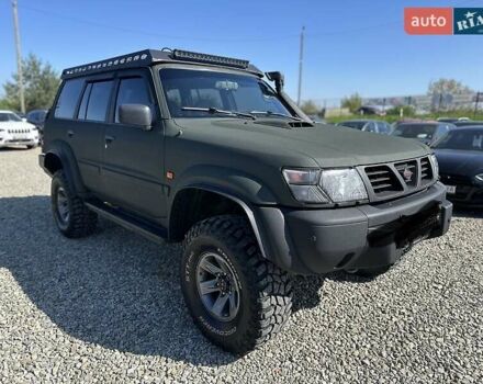 Зелений Ніссан Патрол, об'ємом двигуна 2.95 л та пробігом 333 тис. км за 25000 $, фото 10 на Automoto.ua