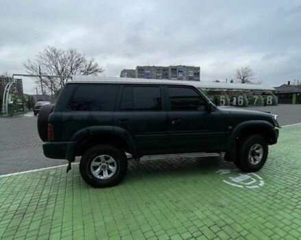 Зелений Ніссан Патрол, об'ємом двигуна 3 л та пробігом 446 тис. км за 15000 $, фото 1 на Automoto.ua