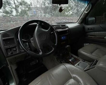 Зелений Ніссан Патрол, об'ємом двигуна 3 л та пробігом 446 тис. км за 15000 $, фото 11 на Automoto.ua