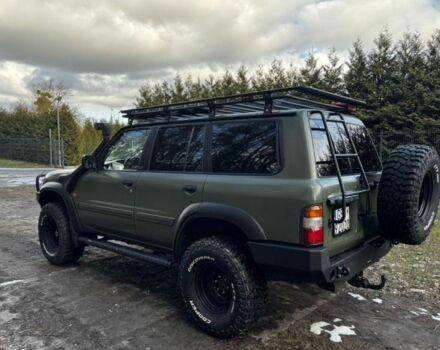 Зелений Ніссан Патрол, об'ємом двигуна 3 л та пробігом 205 тис. км за 4750 $, фото 3 на Automoto.ua