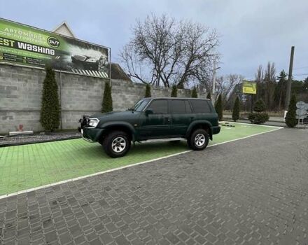 Зелений Ніссан Патрол, об'ємом двигуна 3 л та пробігом 446 тис. км за 15000 $, фото 12 на Automoto.ua