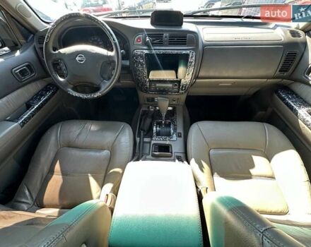 Зелений Ніссан Патрол, об'ємом двигуна 2.95 л та пробігом 333 тис. км за 25000 $, фото 9 на Automoto.ua
