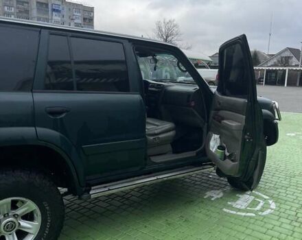 Зелений Ніссан Патрол, об'ємом двигуна 3 л та пробігом 446 тис. км за 15000 $, фото 7 на Automoto.ua