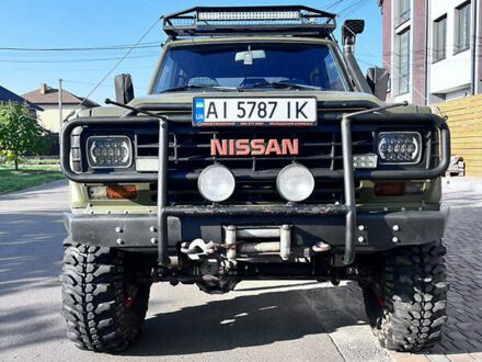 Зеленый Ниссан Патрол, объемом двигателя 3.2 л и пробегом 283 тыс. км за 12000 $, фото 1 на Automoto.ua