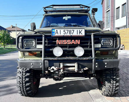 Зеленый Ниссан Патрол, объемом двигателя 3.2 л и пробегом 283 тыс. км за 12000 $, фото 1 на Automoto.ua