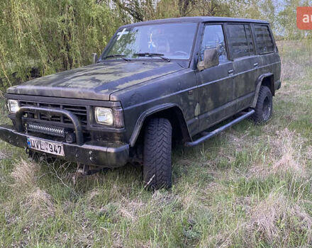 Зеленый Ниссан Патрол, объемом двигателя 2.8 л и пробегом 300 тыс. км за 4197 $, фото 1 на Automoto.ua