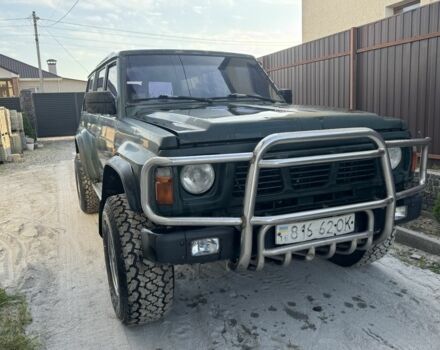 Зеленый Ниссан Патрол, объемом двигателя 2.8 л и пробегом 350 тыс. км за 5900 $, фото 1 на Automoto.ua