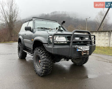 Зелений Ніссан Патрол, об'ємом двигуна 2.83 л та пробігом 254 тис. км за 11800 $, фото 1 на Automoto.ua
