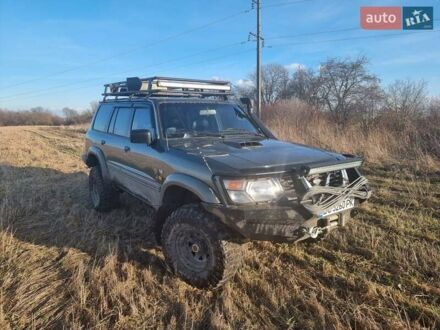 Зеленый Ниссан Патрол, объемом двигателя 2.8 л и пробегом 312 тыс. км за 21500 $, фото 1 на Automoto.ua
