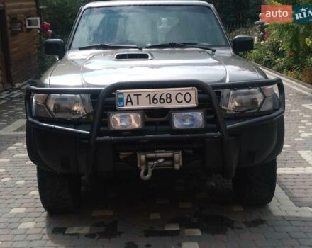 Зеленый Ниссан Патрол, объемом двигателя 2.8 л и пробегом 369 тыс. км за 16000 $, фото 1 на Automoto.ua