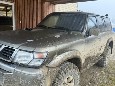 Зеленый Ниссан Патрол, объемом двигателя 2.8 л и пробегом 400 тыс. км за 16000 $, фото 1 на Automoto.ua