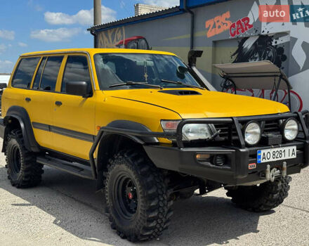 Зеленый Ниссан Патрол, объемом двигателя 4.2 л и пробегом 270 тыс. км за 26800 $, фото 1 на Automoto.ua