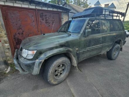 Зеленый Ниссан Патрол, объемом двигателя 2 л и пробегом 400 тыс. км за 7999 $, фото 1 на Automoto.ua