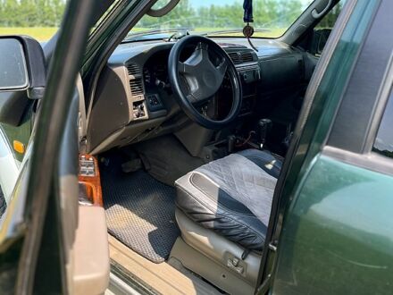 Зелений Ніссан Патрол, об'ємом двигуна 3 л та пробігом 275 тис. км за 11000 $, фото 1 на Automoto.ua