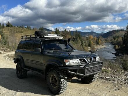 Зелений Ніссан Патрол, об'ємом двигуна 3 л та пробігом 47 тис. км за 16000 $, фото 1 на Automoto.ua