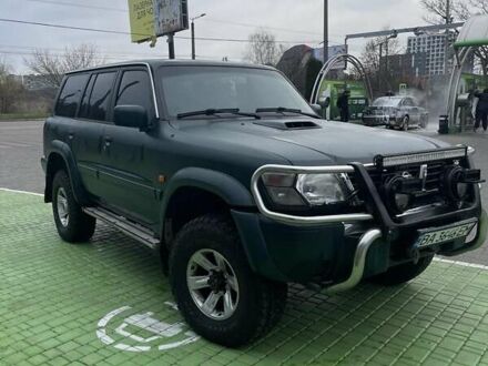 Зелений Ніссан Патрол, об'ємом двигуна 3 л та пробігом 446 тис. км за 15000 $, фото 1 на Automoto.ua