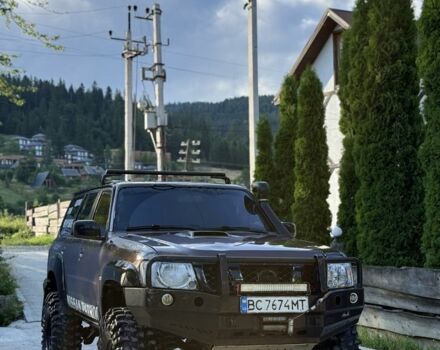Зеленый Ниссан Патрол, объемом двигателя 3 л и пробегом 245 тыс. км за 13500 $, фото 1 на Automoto.ua