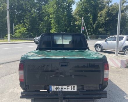 Чорний Ніссан Пікап, об'ємом двигуна 0 л та пробігом 280 тис. км за 5100 $, фото 4 на Automoto.ua