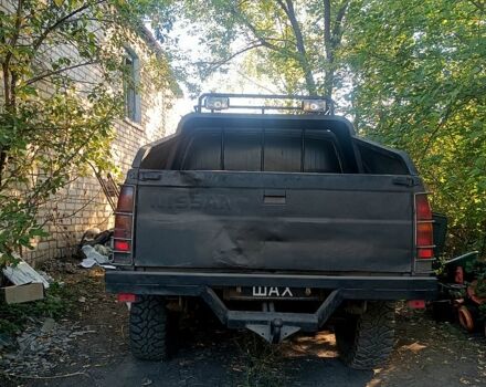 Черный Ниссан Пикап, объемом двигателя 2.5 л и пробегом 0 тыс. км за 3000 $, фото 1 на Automoto.ua