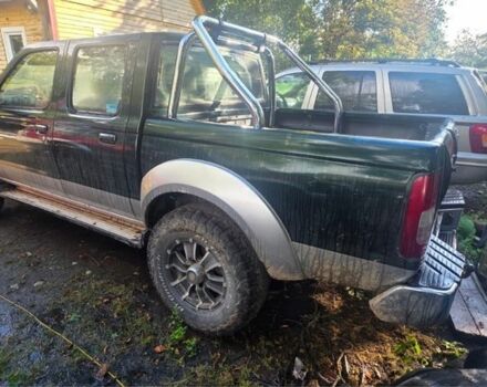 Зелений Ніссан Пікап, об'ємом двигуна 2.5 л та пробігом 300 тис. км за 6426 $, фото 7 на Automoto.ua