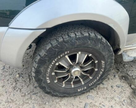 Зелений Ніссан Пікап, об'ємом двигуна 2.5 л та пробігом 300 тис. км за 6426 $, фото 11 на Automoto.ua