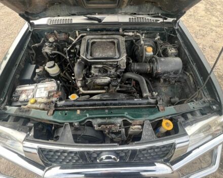 Зелений Ніссан Пікап, об'ємом двигуна 2.5 л та пробігом 300 тис. км за 6426 $, фото 10 на Automoto.ua