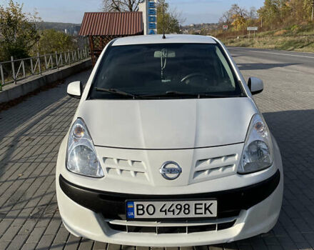 Белый Ниссан Пиксо, объемом двигателя 1 л и пробегом 206 тыс. км за 3500 $, фото 1 на Automoto.ua
