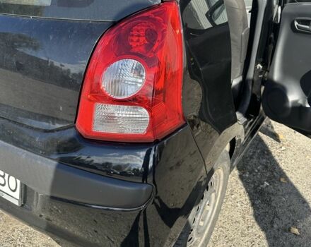 Черный Ниссан Пиксо, объемом двигателя 1 л и пробегом 150 тыс. км за 3300 $, фото 2 на Automoto.ua