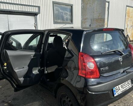 Черный Ниссан Пиксо, объемом двигателя 1 л и пробегом 150 тыс. км за 3300 $, фото 5 на Automoto.ua