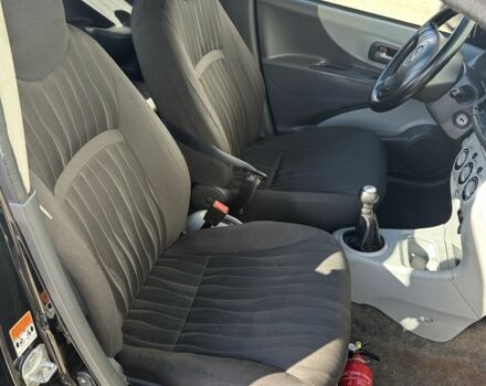 Черный Ниссан Пиксо, объемом двигателя 1 л и пробегом 150 тыс. км за 3300 $, фото 3 на Automoto.ua