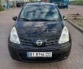 Черный Ниссан Пиксо, объемом двигателя 1 л и пробегом 123 тыс. км за 4200 $, фото 1 на Automoto.ua