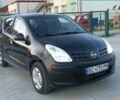 Чорний Ніссан Піксо, об'ємом двигуна 1 л та пробігом 80 тис. км за 2800 $, фото 1 на Automoto.ua
