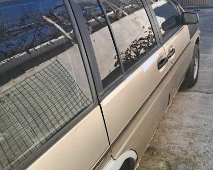 Бежевий Ніссан Прерія, об'ємом двигуна 2 л та пробігом 280 тис. км за 2000 $, фото 2 на Automoto.ua