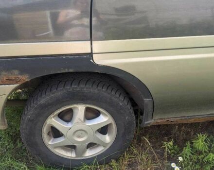 Чорний Ніссан Прерія, об'ємом двигуна 2 л та пробігом 400 тис. км за 750 $, фото 3 на Automoto.ua