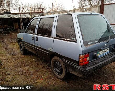 Синій Ніссан Прерія, об'ємом двигуна 2 л та пробігом 100 тис. км за 1100 $, фото 3 на Automoto.ua