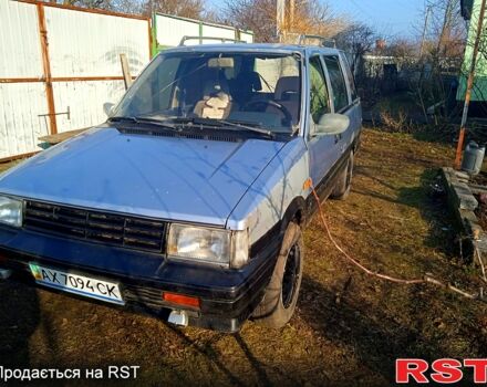 Синій Ніссан Прерія, об'ємом двигуна 2 л та пробігом 100 тис. км за 1100 $, фото 1 на Automoto.ua