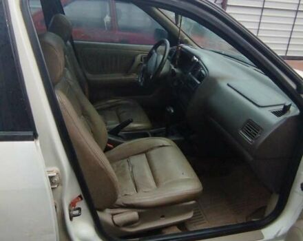 Белый Ниссан Примера, объемом двигателя 2 л и пробегом 250 тыс. км за 592 $, фото 3 на Automoto.ua