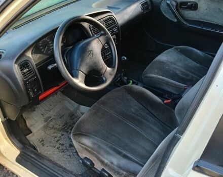 Бежевый Ниссан Примера, объемом двигателя 2 л и пробегом 270 тыс. км за 1550 $, фото 3 на Automoto.ua