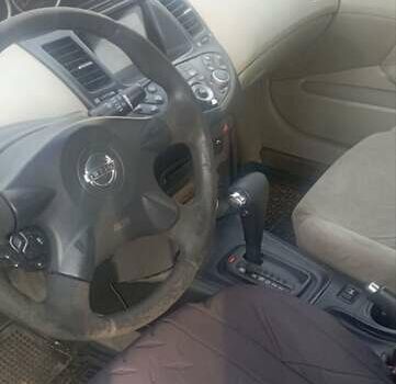 Бежевый Ниссан Примера, объемом двигателя 1.77 л и пробегом 280 тыс. км за 1500 $, фото 4 на Automoto.ua