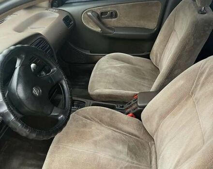 Бежевый Ниссан Примера, объемом двигателя 2 л и пробегом 430 тыс. км за 1200 $, фото 4 на Automoto.ua