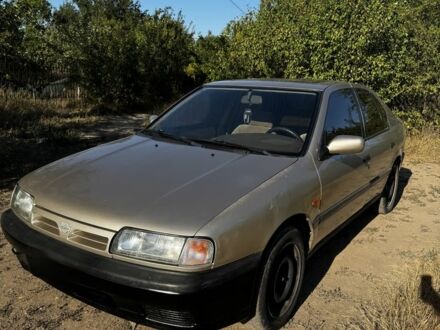 Бежевий Ніссан Прімера, об'ємом двигуна 2 л та пробігом 300 тис. км за 1100 $, фото 1 на Automoto.ua