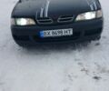 Черный Ниссан Примера, объемом двигателя 1.6 л и пробегом 386 тыс. км за 2100 $, фото 1 на Automoto.ua