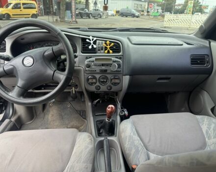 Чорний Ніссан Прімера, об'ємом двигуна 1.6 л та пробігом 207 тис. км за 2199 $, фото 12 на Automoto.ua