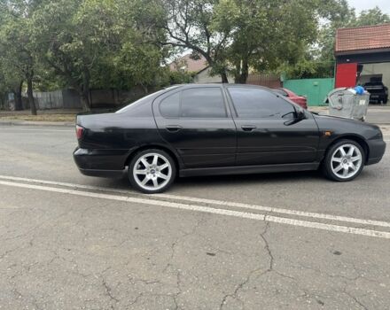 Чорний Ніссан Прімера, об'ємом двигуна 1.6 л та пробігом 207 тис. км за 2199 $, фото 6 на Automoto.ua