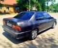 Чорний Ніссан Прімера, об'ємом двигуна 2 л та пробігом 180 тис. км за 950 $, фото 1 на Automoto.ua