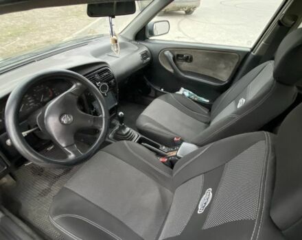 Чорний Ніссан Прімера, об'ємом двигуна 2 л та пробігом 430 тис. км за 1600 $, фото 6 на Automoto.ua