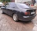 Черный Ниссан Примера, объемом двигателя 1.8 л и пробегом 350 тыс. км за 1800 $, фото 3 на Automoto.ua