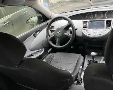 Черный Ниссан Примера, объемом двигателя 2 л и пробегом 150 тыс. км за 4300 $, фото 4 на Automoto.ua